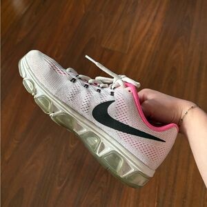 Nike White and Pink Athletic Shoes with Modern Design